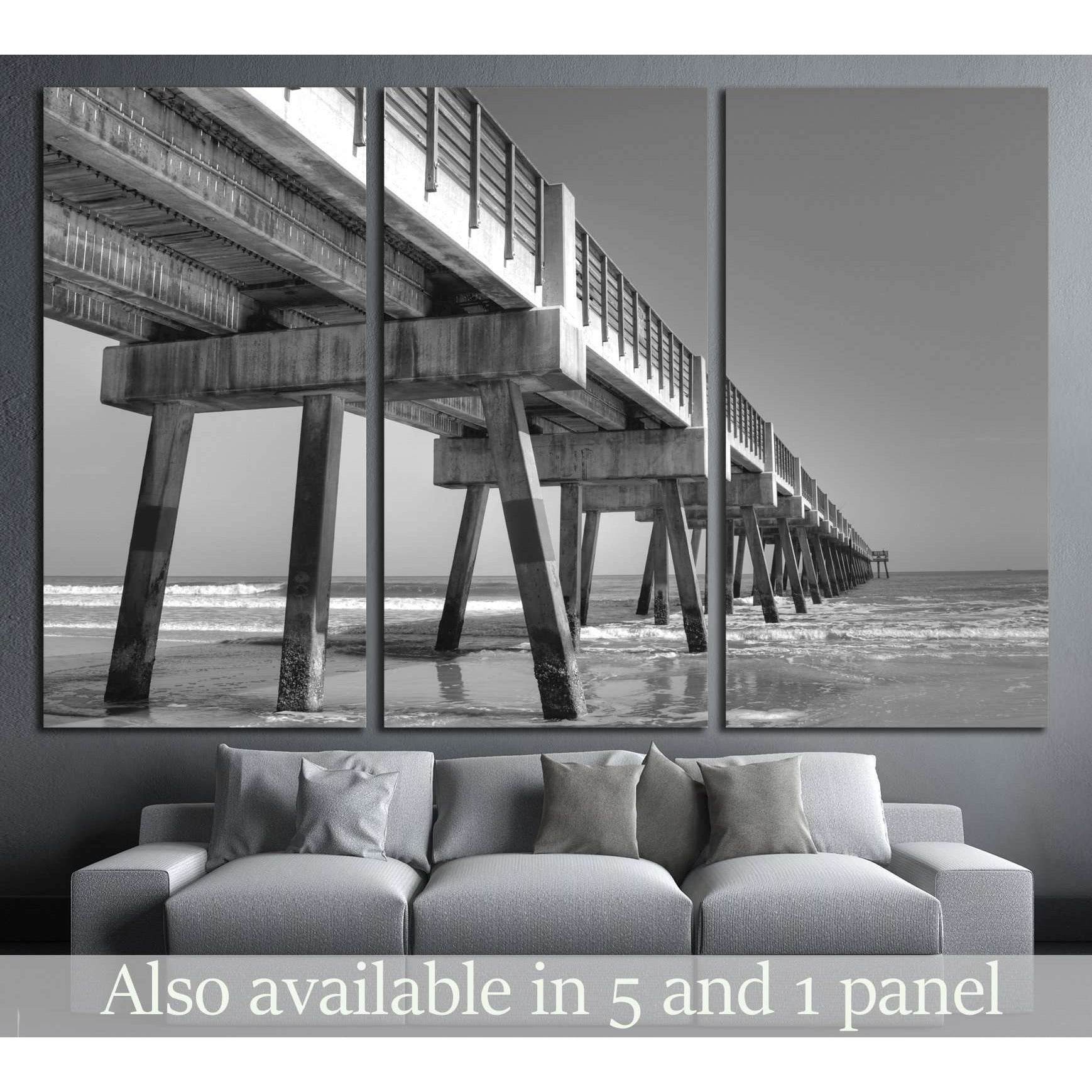 Fishing Pier in Jacksonville Beach, Florida №2498 Ready to Hang Canvas PrintThis canvas print features a black and white photograph of a pier extending into the sea, offering a perspective that leads the viewer's eye into the horizon. Its monochromatic to