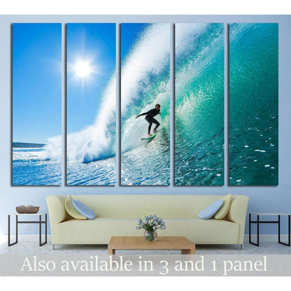 Dynamic Surfer Wave Triptych Canvas for Beach House DecorThis triptych canvas print captures a surfer skillfully navigating a towering wave, with the sun shining brightly in a clear blue sky. The dynamic composition and vivid colors convey the excitement